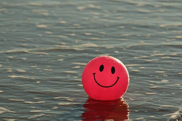 Sourire ballon satisfaction client